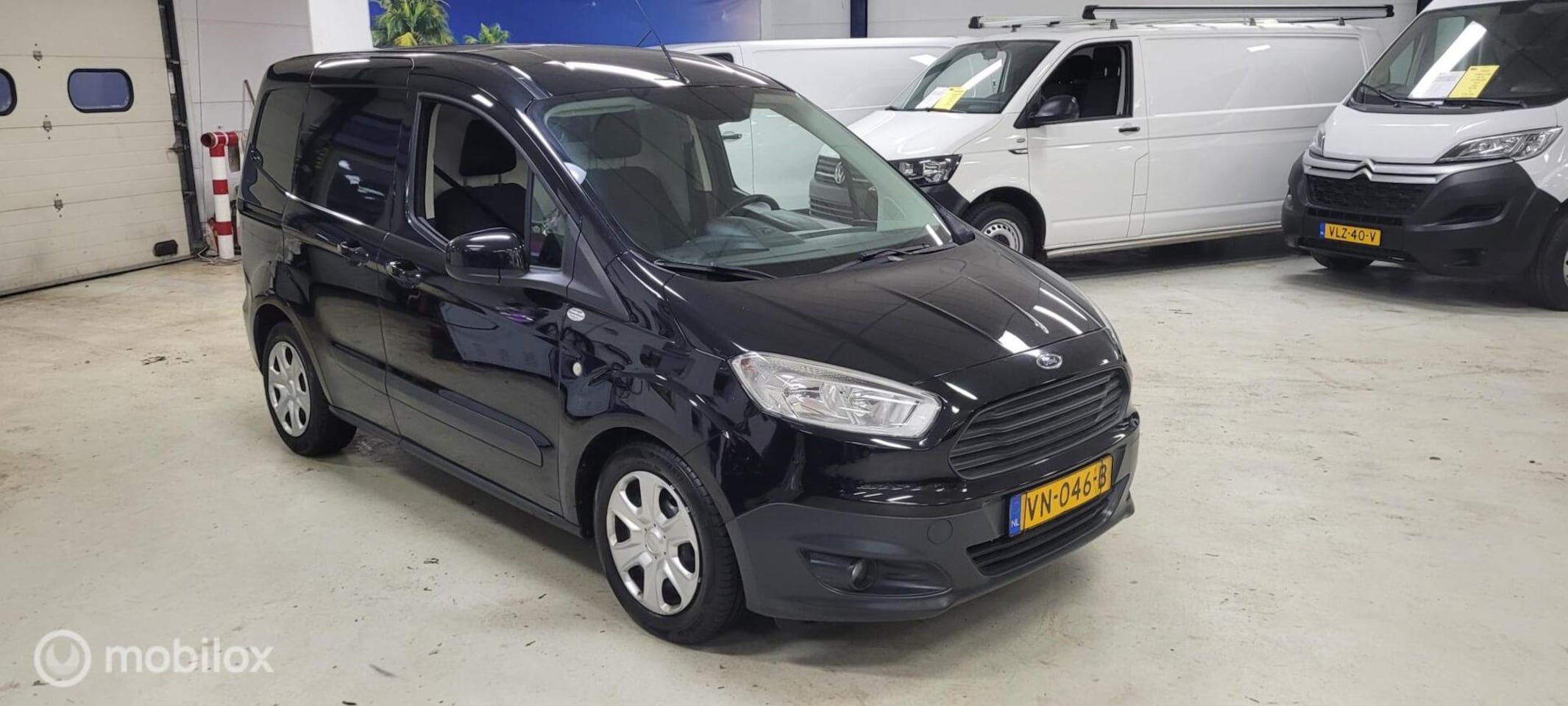 Ford Transit Courier - 1.5 TDCI Ambiente 1.5 TDCI Ambiente - AutoWereld.nl