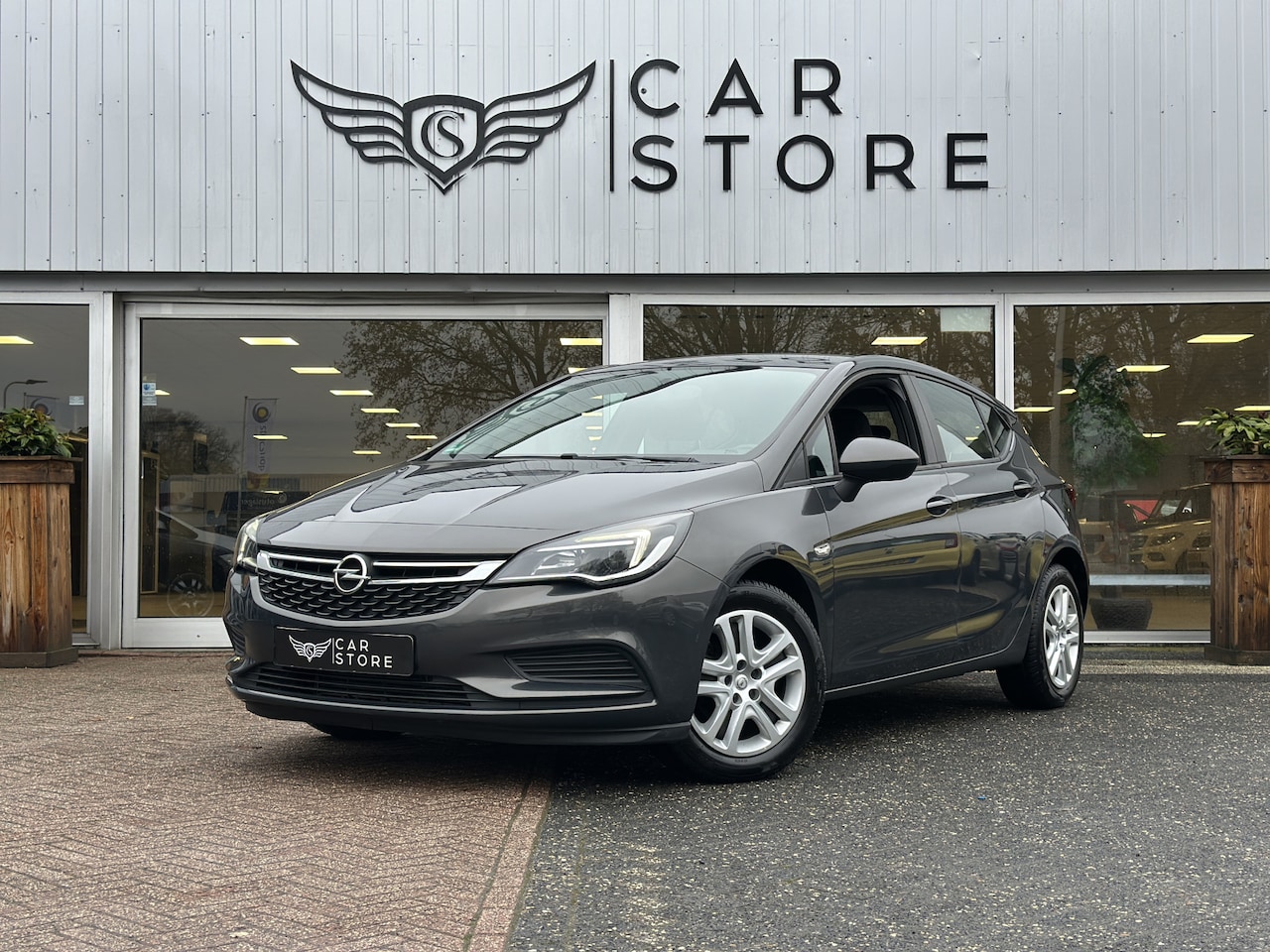 Opel Astra - 1.0 Edition |CRUISE|AIRCO|STUUR+ST VWM|LED|NAV - AutoWereld.nl