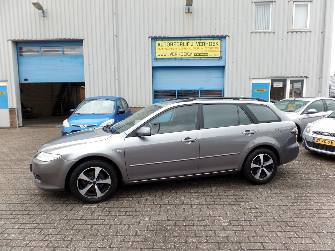 Mazda 6 Sportbreak - 1.8i Touring airco - AutoWereld.nl
