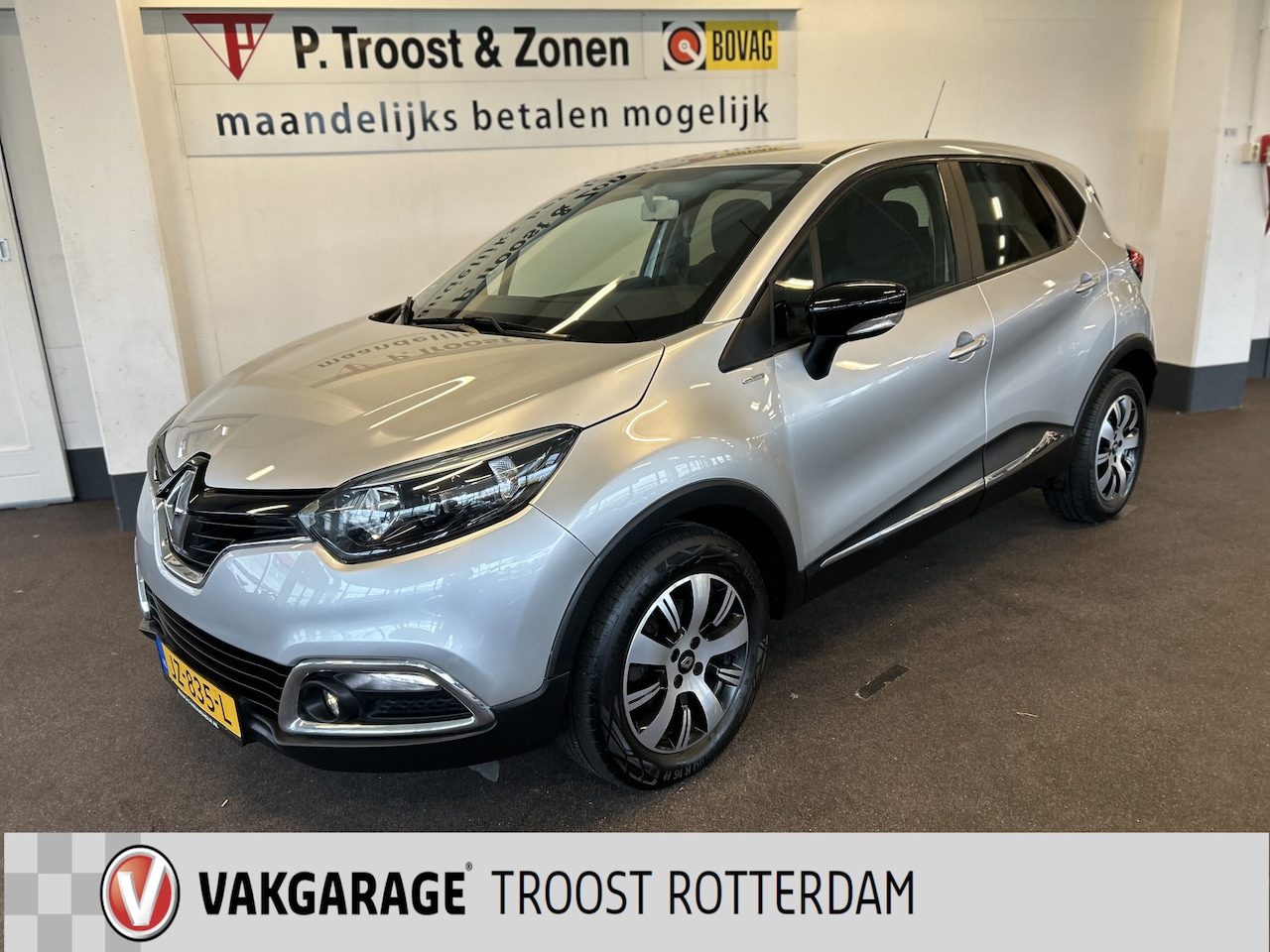 Renault Captur - 1.2 TCe Limited Automaat | Dealer onderhouden | Nederlands geleverd | Navigatie | Cruise c - AutoWereld.nl