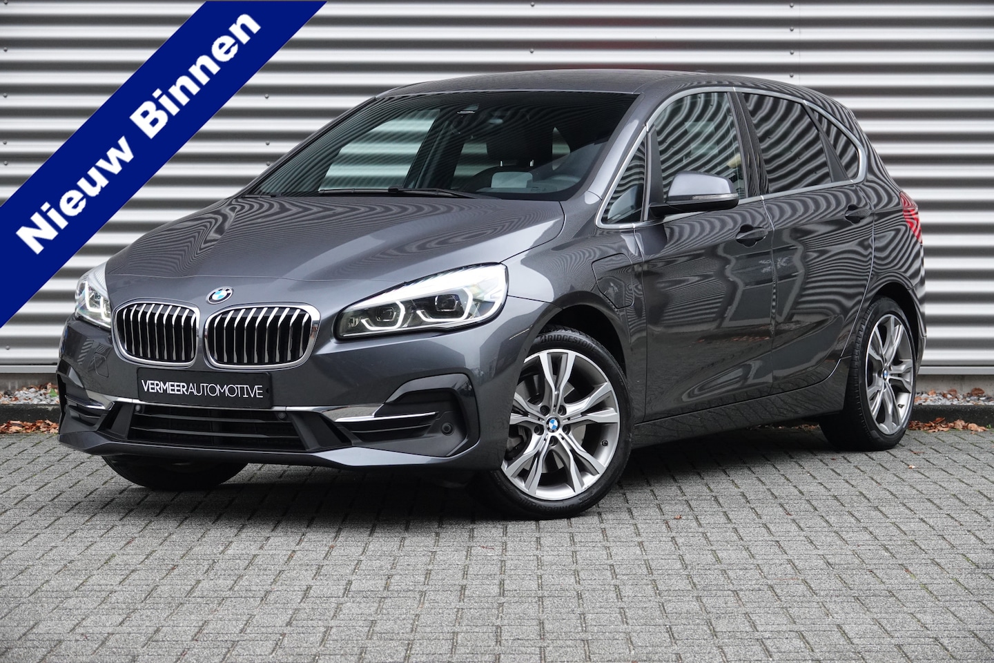 BMW 2-serie Active Tourer - 225xe iPerformance High Executive | Harman & Kardon | Leder | HUD | Camera | Navi | DAB | - AutoWereld.nl
