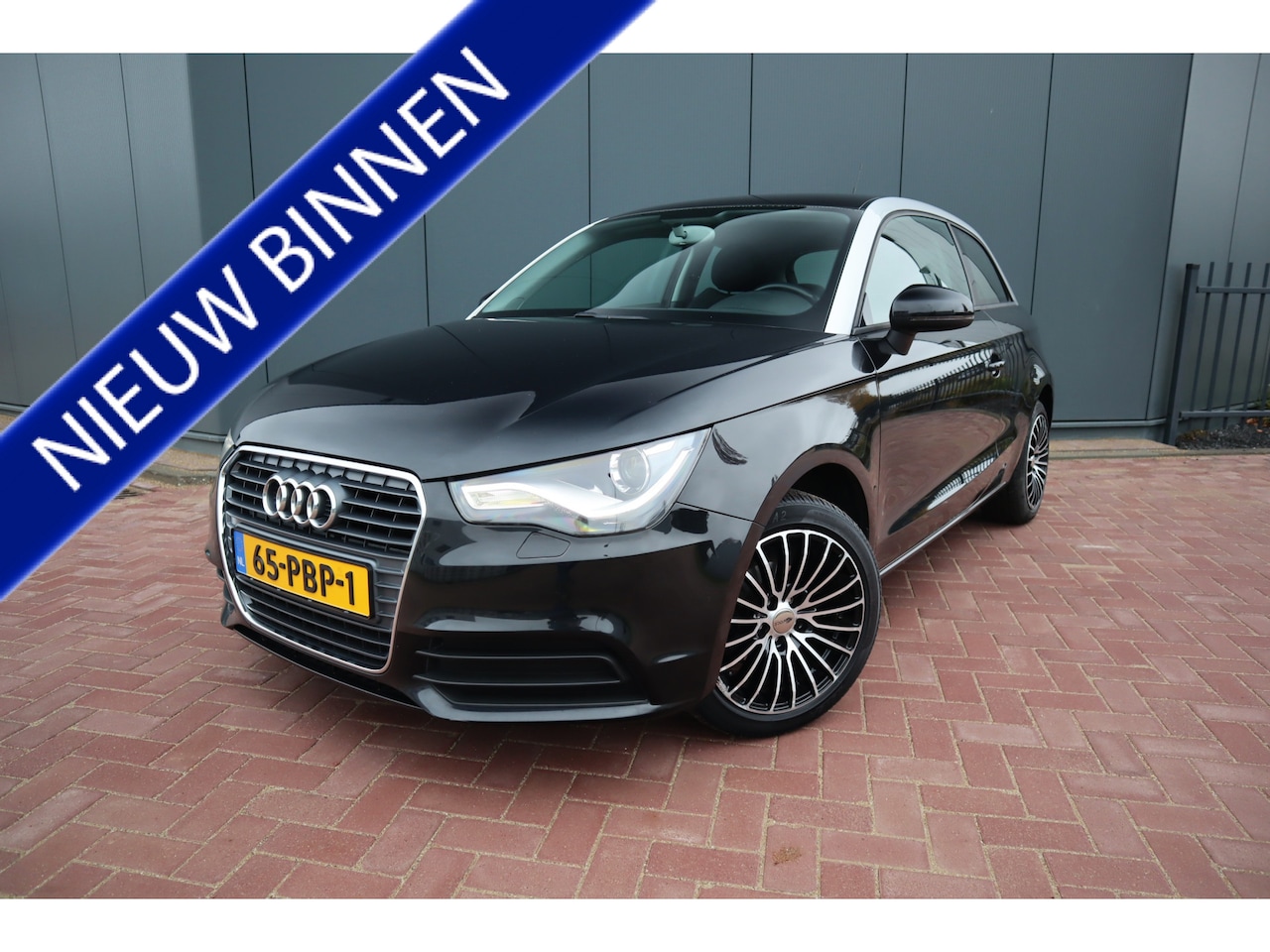 Audi A1 - 1.2 TFSI Attraction Pro Line Business Xenon Navigatie Cruise control - AutoWereld.nl