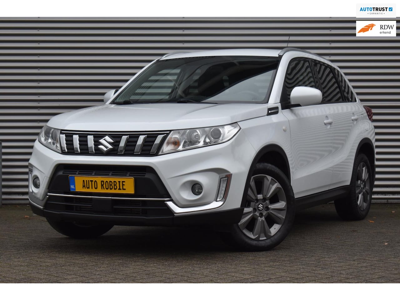 Suzuki Vitara - 1.0 Boosterjet, Airco, Ecc, Cruise, Navi, Camera, Trekhaak. - AutoWereld.nl