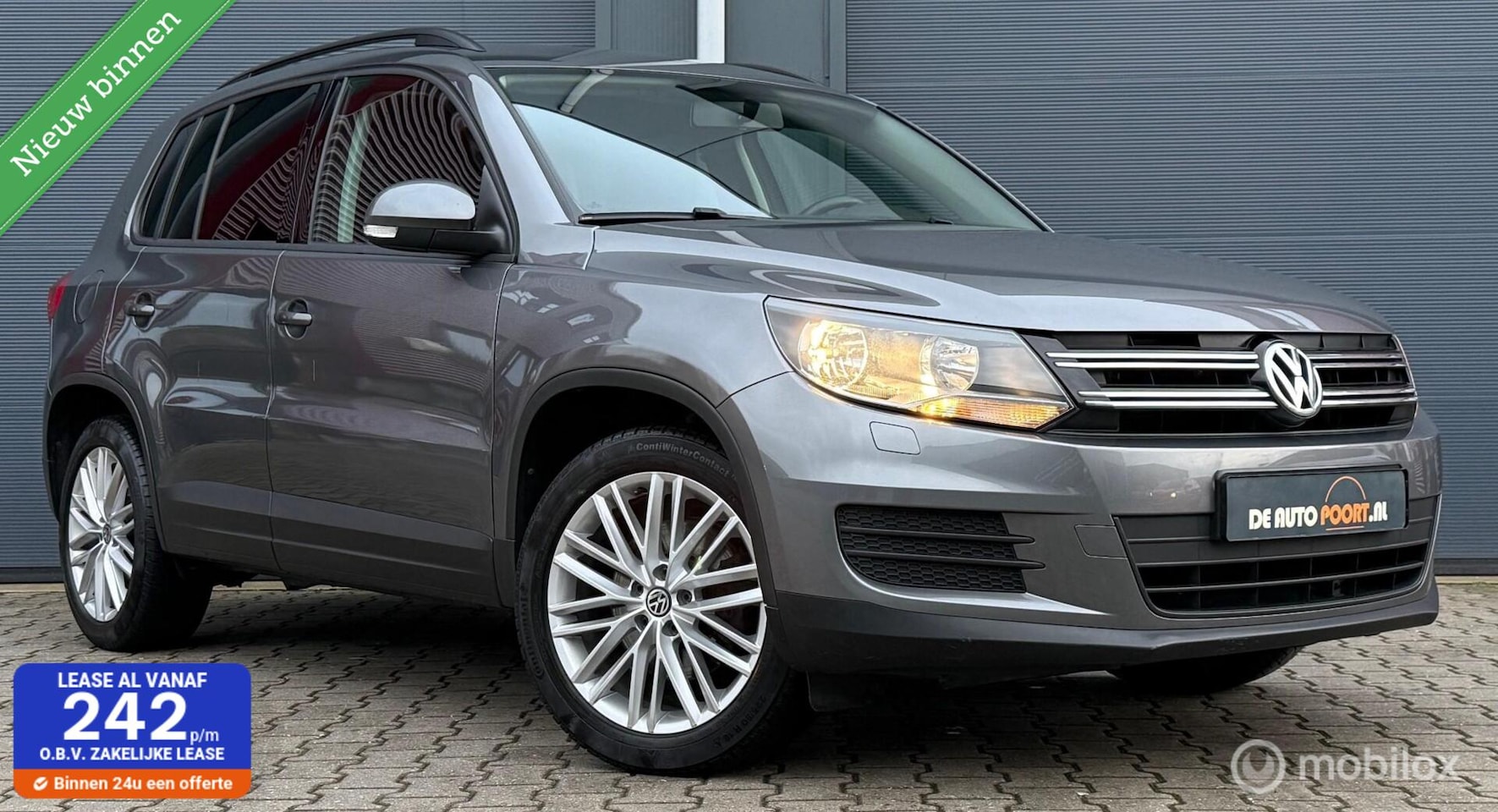 Volkswagen Tiguan - 1.4 TSI Sport&Style DSG Navi+/Trekhaak/Clima - AutoWereld.nl