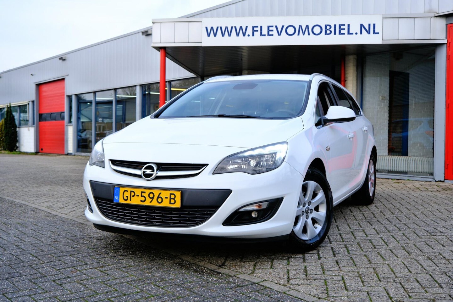 Opel Astra Sports Tourer - 1.4 Business + Navi|Airco|Cruise|LMV - AutoWereld.nl