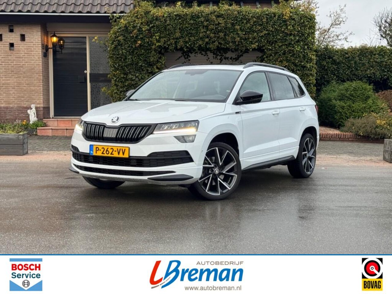 Skoda Karoq - 1.5 TSI ACT SPORTLINE BUSINESS DSG Panodak trekhaak - AutoWereld.nl