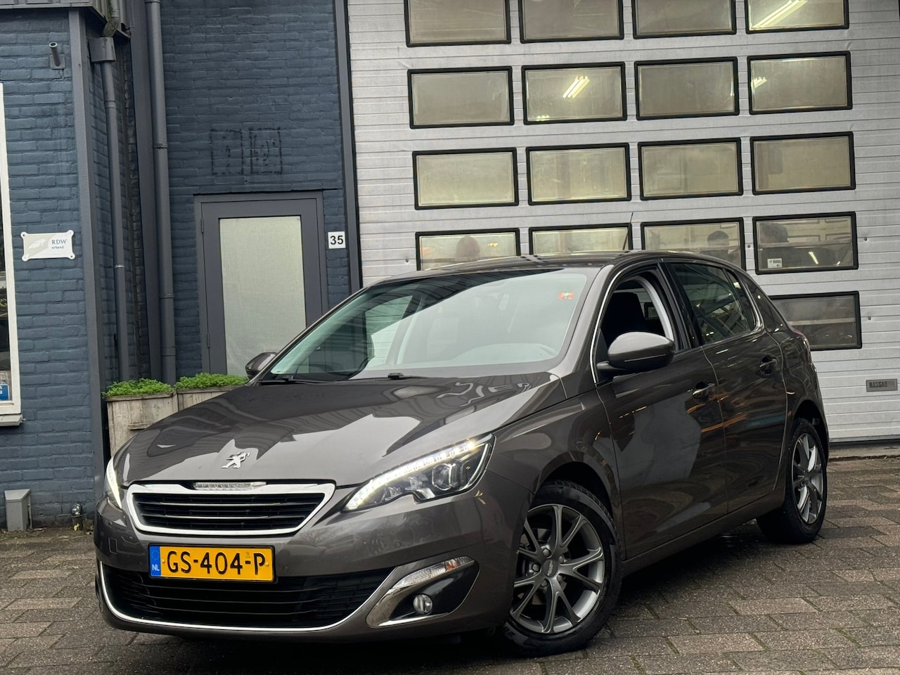 Peugeot 308 - 1.2 PureTech Allure | Navi | Airco | Cruise | PDC V+A - AutoWereld.nl