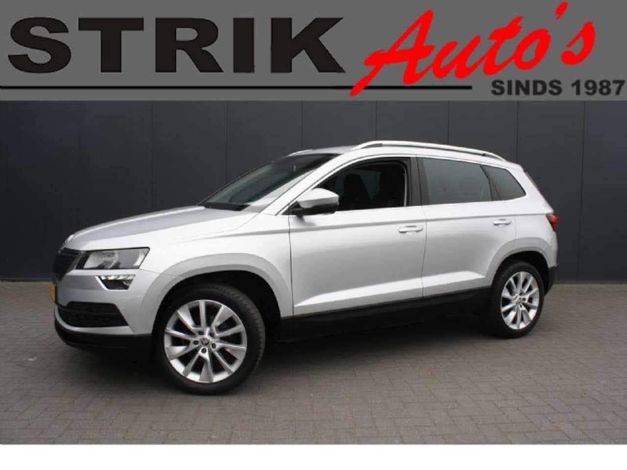 Skoda Karoq - 1.0 TSI Ambition Business AUTOMAAT - RIJKLAAR - NAVIGATIE - CAMERA - TREKHAAK - 1e EIGENAA - AutoWereld.nl