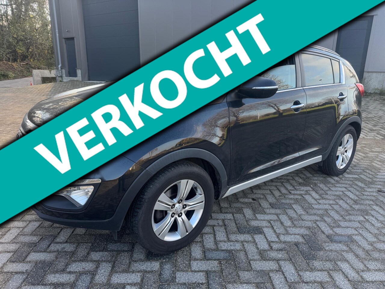 Kia Sportage - 1.6 GDI ISG X-clusive 1.6 GDI ISG X-clusive - AutoWereld.nl