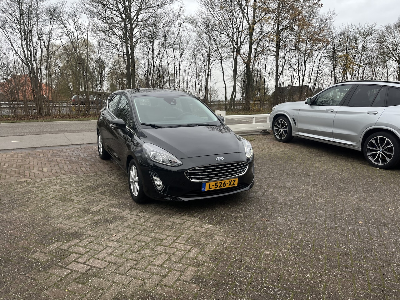 Ford Fiesta - 1.0 EcoBoost Hybrid Titanium CLIMA CARPLAY NAVI PDC CRUISE - AutoWereld.nl
