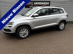 Skoda Karoq - 1.0 TSI Ambition | Airco | Cruise control | Navigatie | Trekhaak | LM Velgen | PDC achter