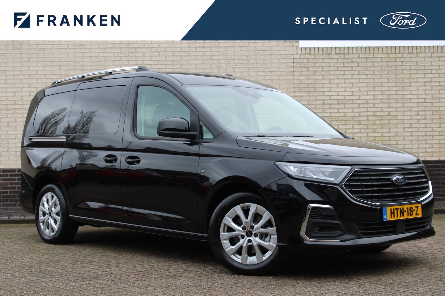 Ford Tourneo Connect Grand - 1.5 PHEV Titanium 7 zits | Luxe | Cruise control | Carplay - AutoWereld.nl
