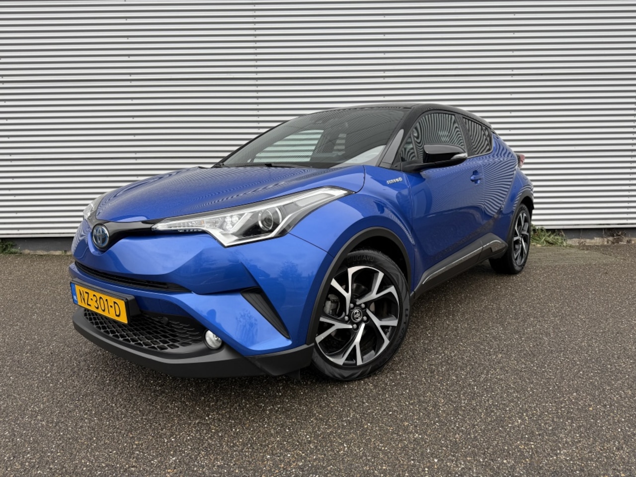 Toyota C-HR - 1.8 Hybrid Bi-Tone NAP Trekhaak navi 18" stoelverwarming - AutoWereld.nl