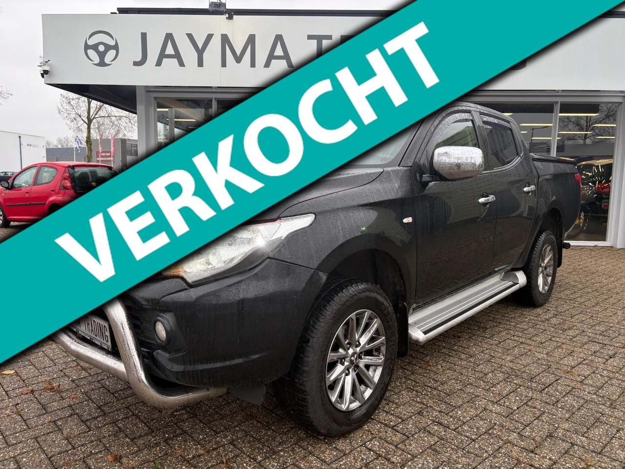 Mitsubishi L 200 - 2.4 DI-D Club Cab Invite 2.4 DI-D Club Cab Invite - AutoWereld.nl
