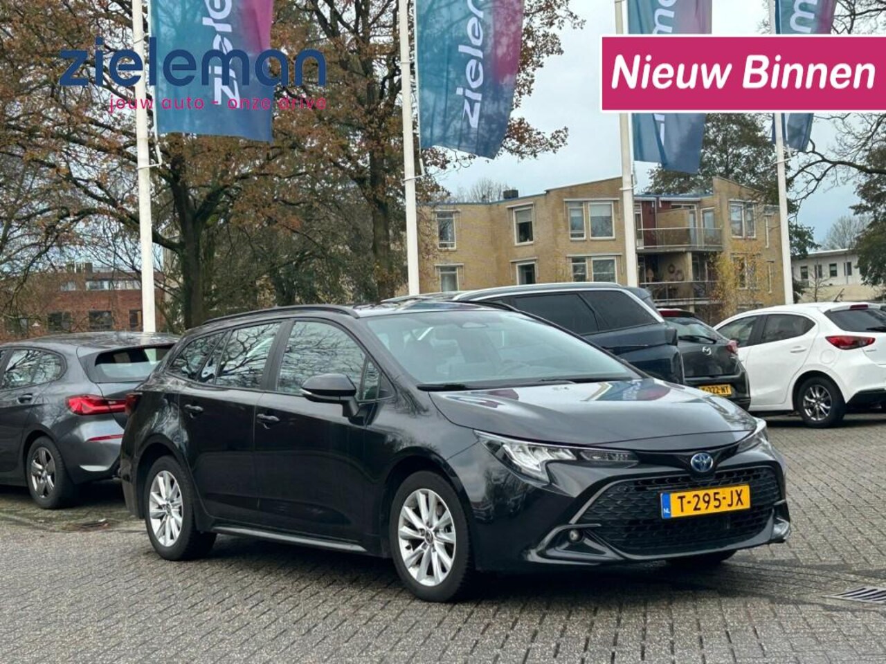 Toyota Corolla Touring Sports - 1.8 Touring Sports Hybrid 140 Active - Carplay, Navi, Camera, Cruise - AutoWereld.nl