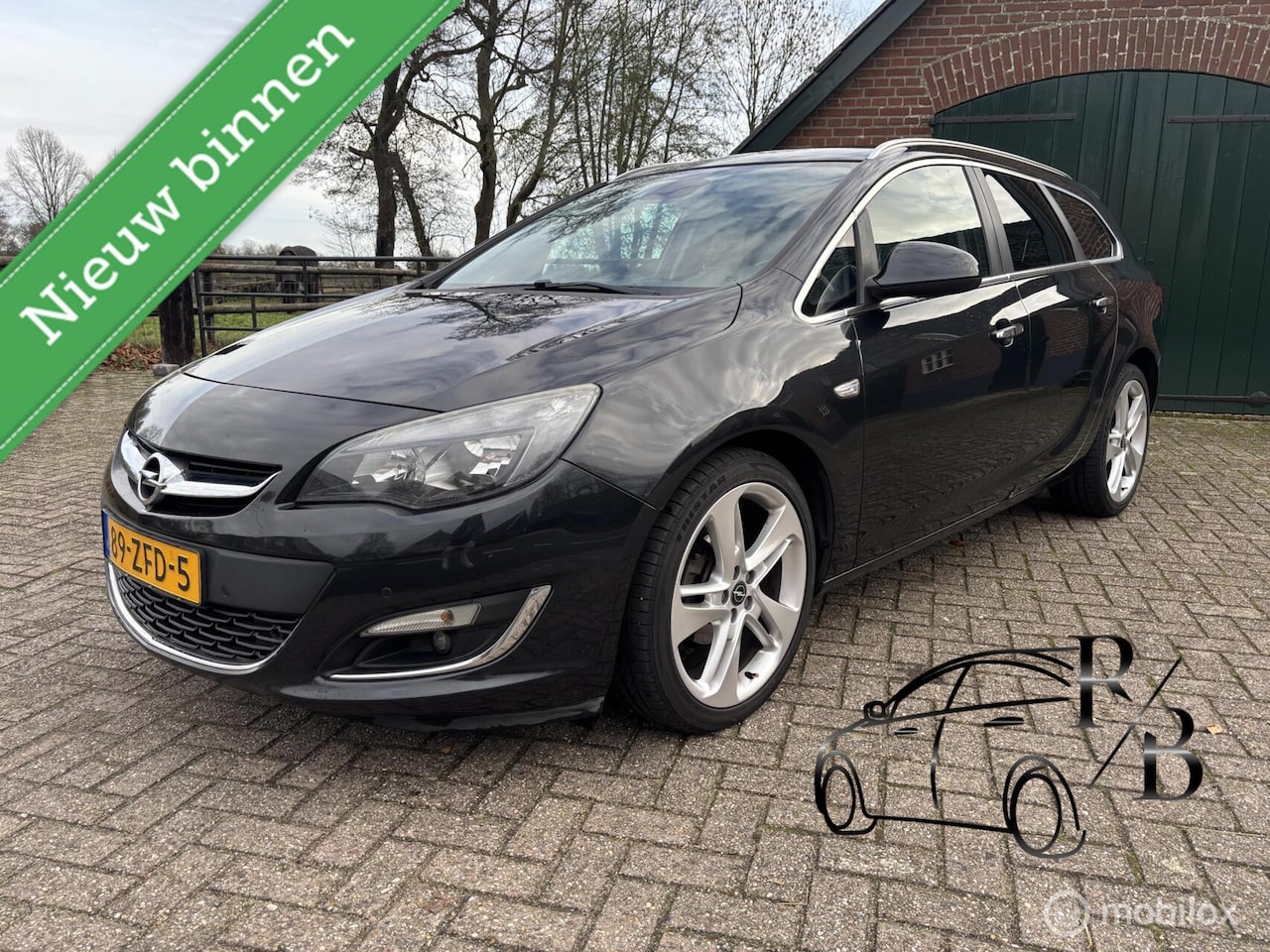 Opel Astra Sports Tourer - 1.4 Turbo LPG Cosmo 1.4 Turbo LPG Cosmo - AutoWereld.nl
