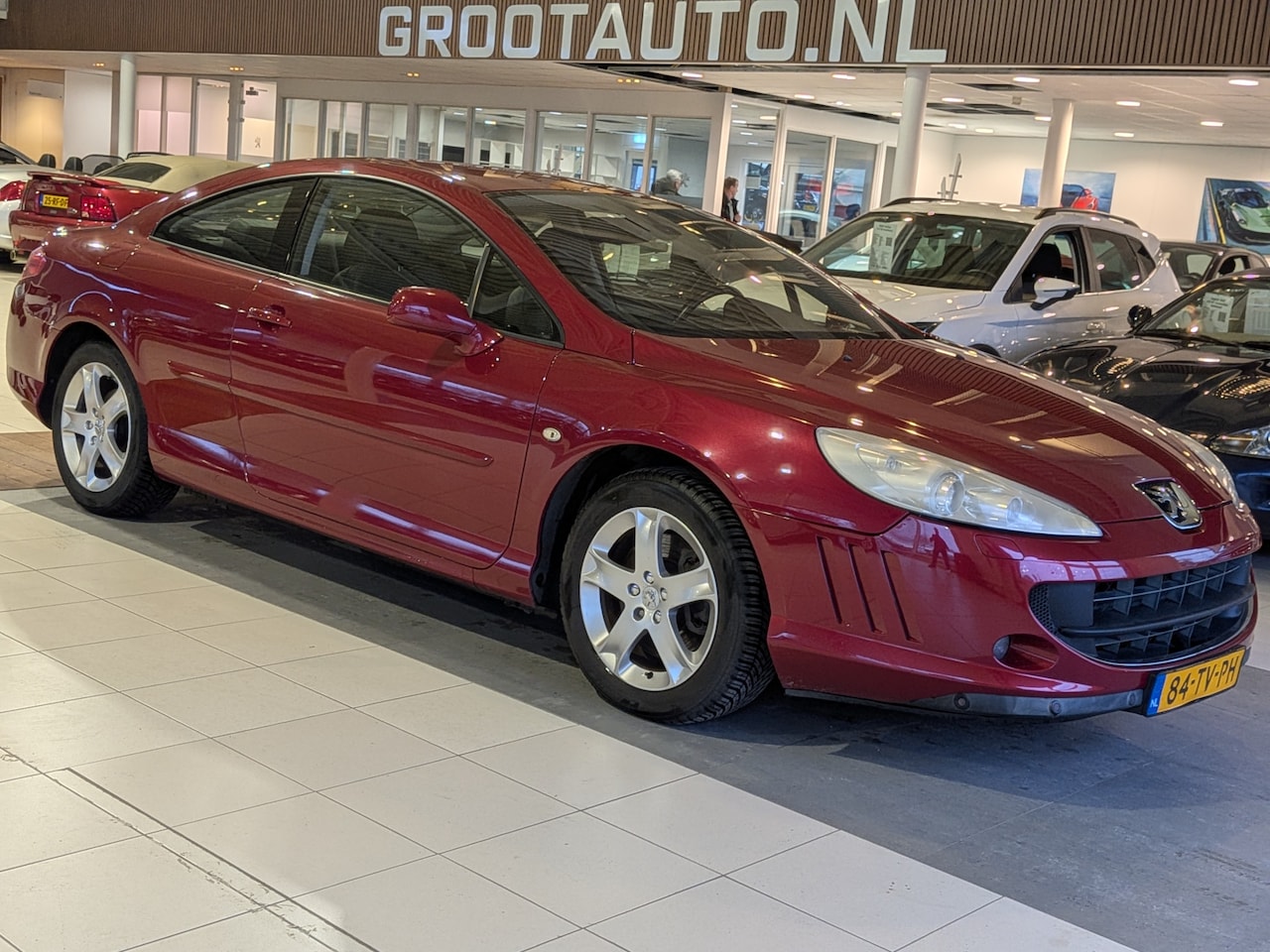 Peugeot 407 Coupé - 2.2-16V Pack 135.667km NAP, Airco, Leder, Cruise control - AutoWereld.nl