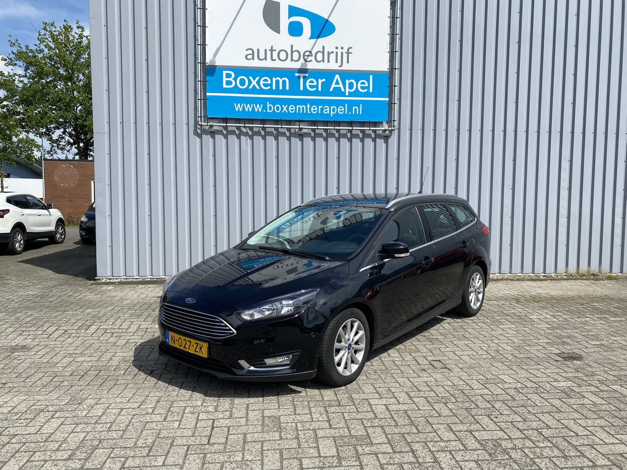 Ford Focus Wagon - 1.0 Titanium | LM velgen | Navigatie | Trekhaak - AutoWereld.nl