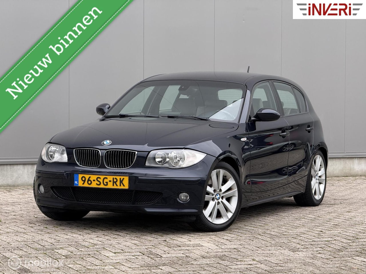 BMW 1-serie - 130i High Executive | Handbak | Clima | Navi | Sportstoelen - AutoWereld.nl