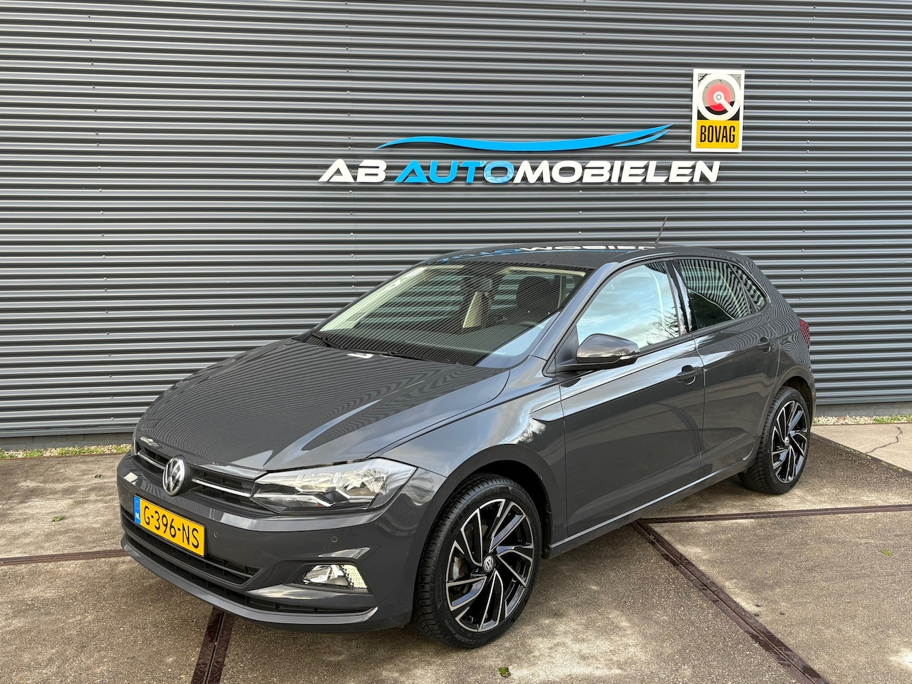 Volkswagen Polo - 1.0 TSI Comfortline AUTOMAAT/ PARKEERSENSOREN - AutoWereld.nl