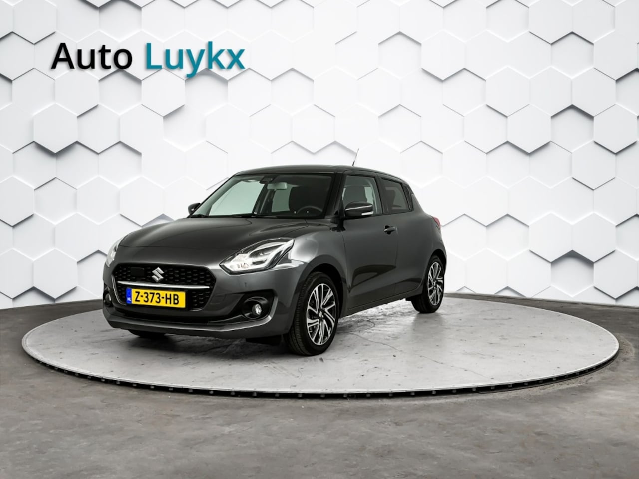 Suzuki Swift - 1.2 Style Smart Hybrid | Navigatie | Adaptieve Cruise Control | Climate Control - AutoWereld.nl