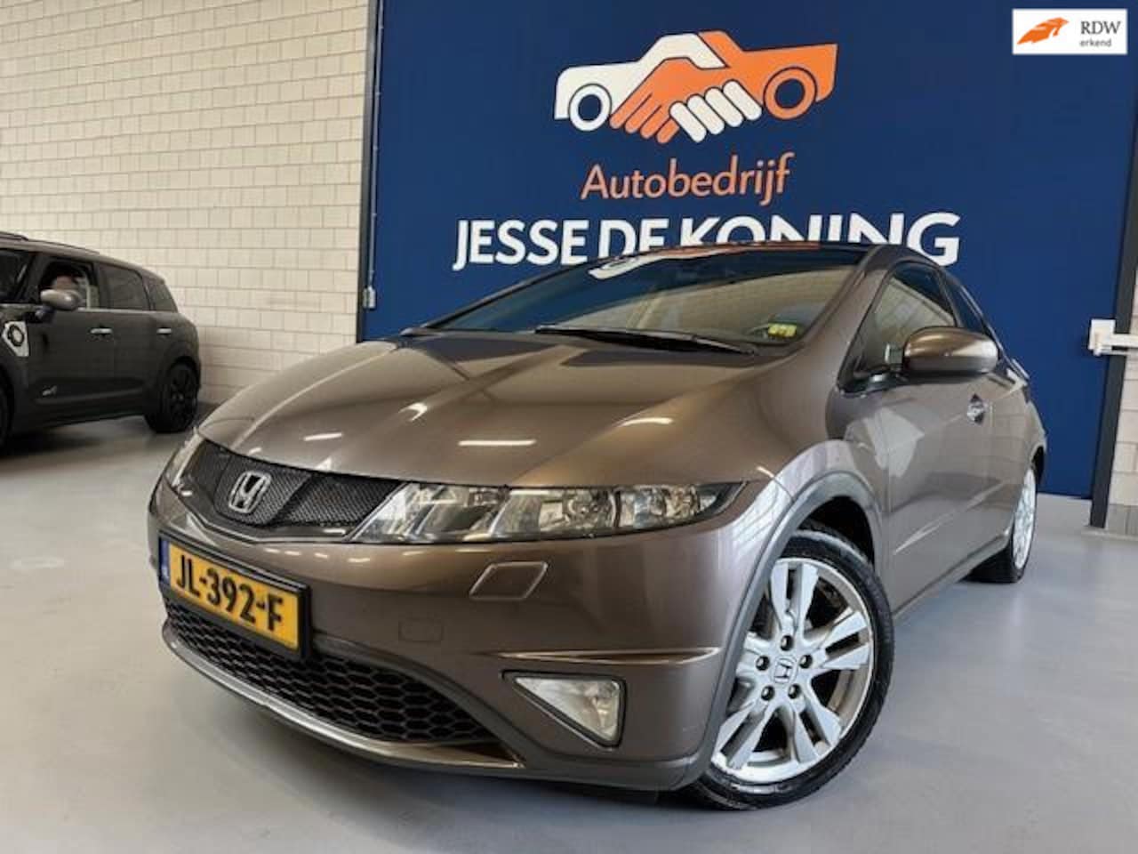 Honda Civic - 1.8 Executive automaat / bj.2011/ kleur: bruin/ navigatie/climate/trekhaak/sportvelgen/APK - AutoWereld.nl