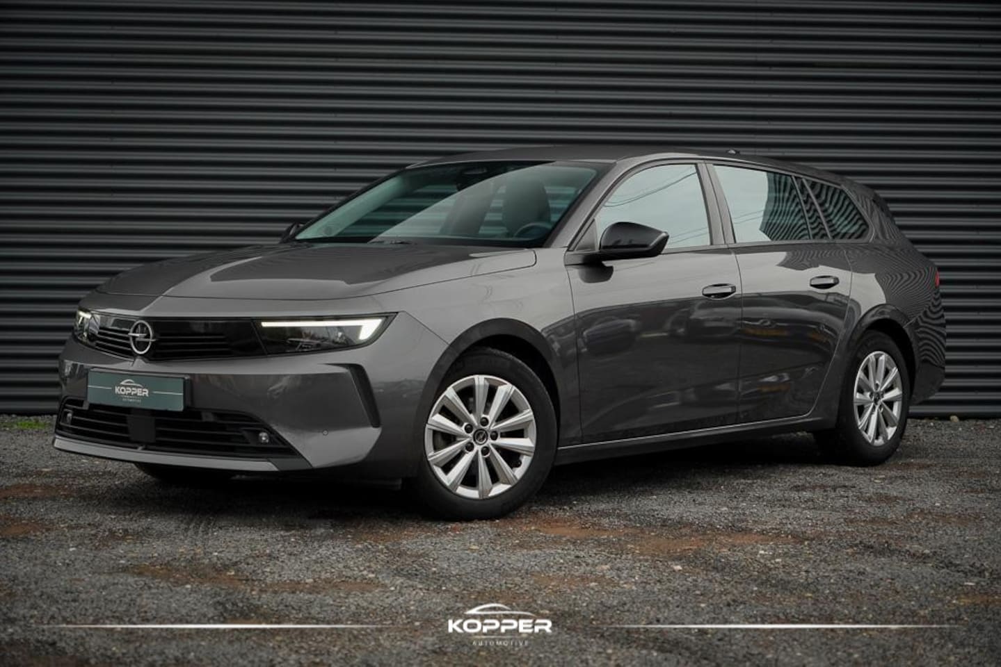 Opel Astra Sports Tourer - 1.2 Turbo / Led / Navi / Cruise / Incl BTW / NL Auto - AutoWereld.nl