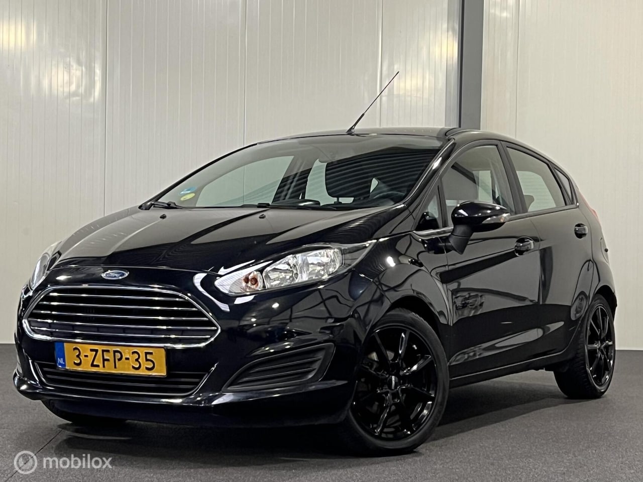 Ford Fiesta - 1.6 TDCi Style 5-drs [ NAP navi nw.distributie LM ] - AutoWereld.nl