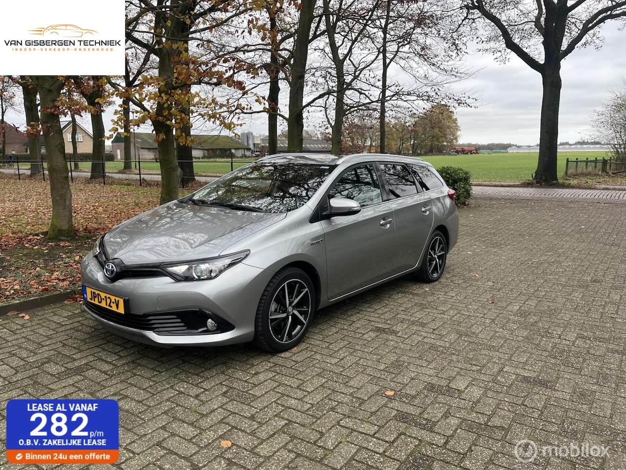Toyota Auris Touring Sports - 1.8 Hybrid Freestyle camera,navi - AutoWereld.nl