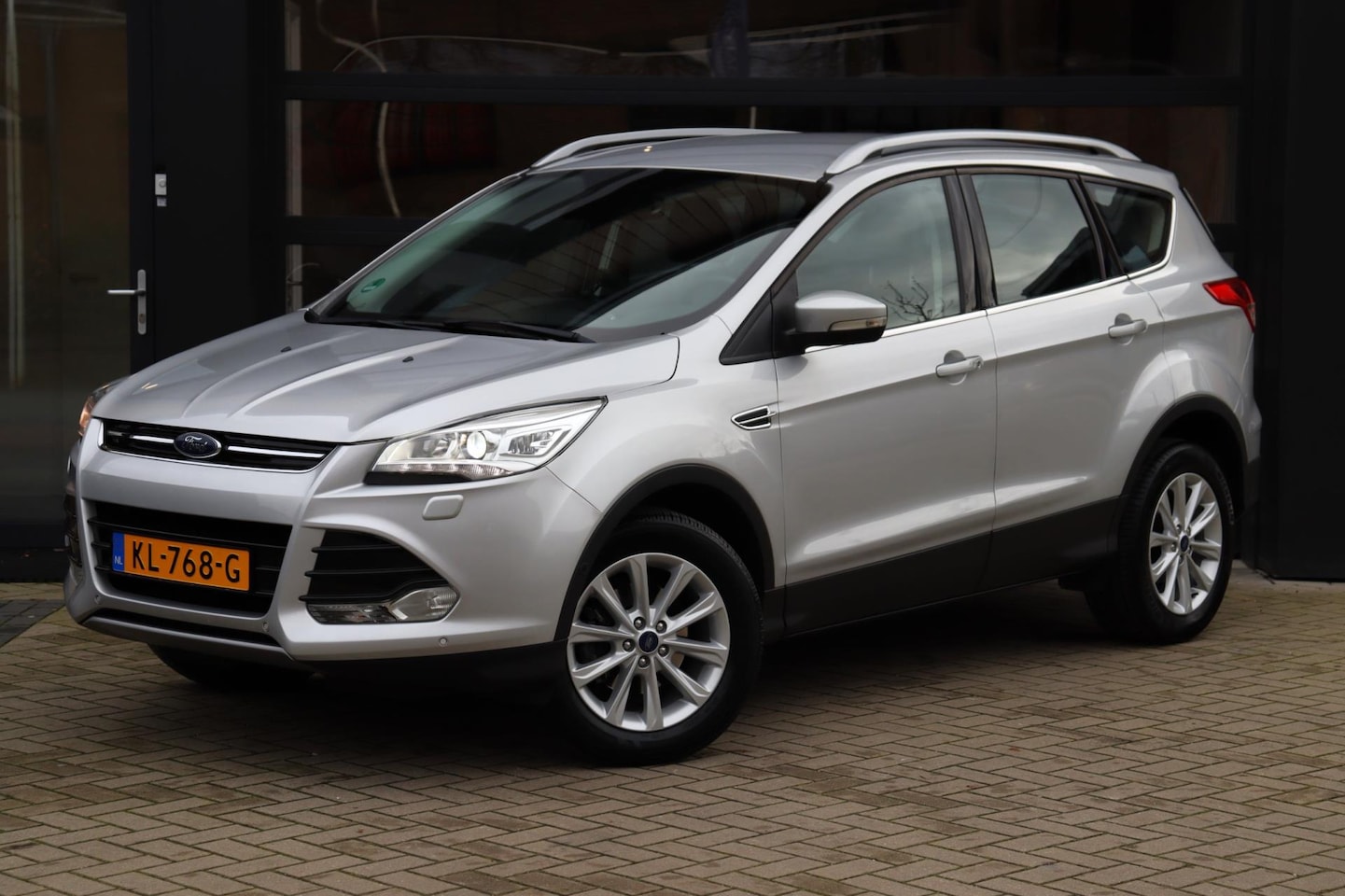 Ford Kuga - 1.5 Titanium | NAP | Eerste Eigenaar | Xenon | Stoelverwarming | Navi | Camera | Climate C - AutoWereld.nl