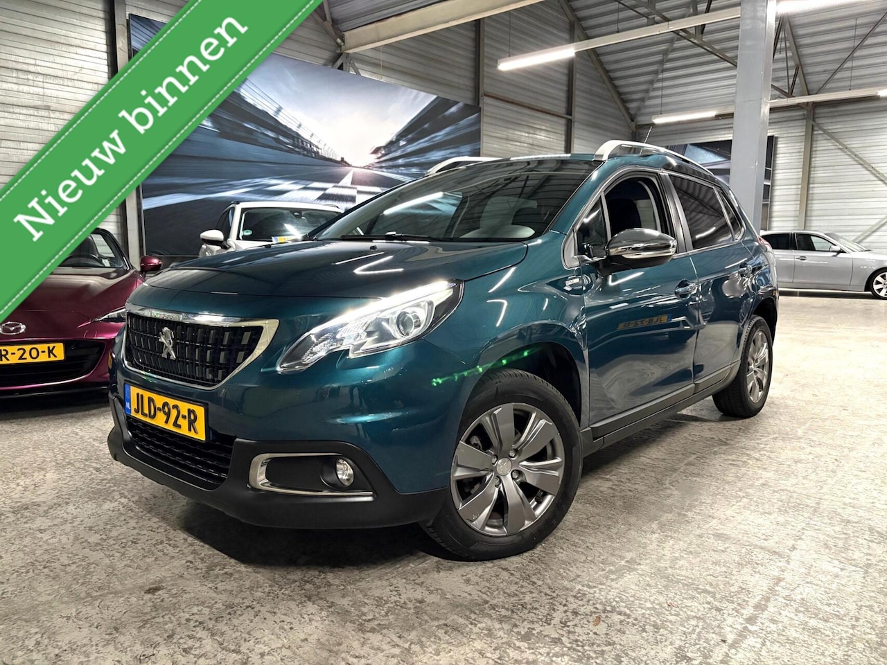 Peugeot 2008 - 1.2 PT Style | OH compleet | Dist.riem vv | Clima | Cruise - AutoWereld.nl