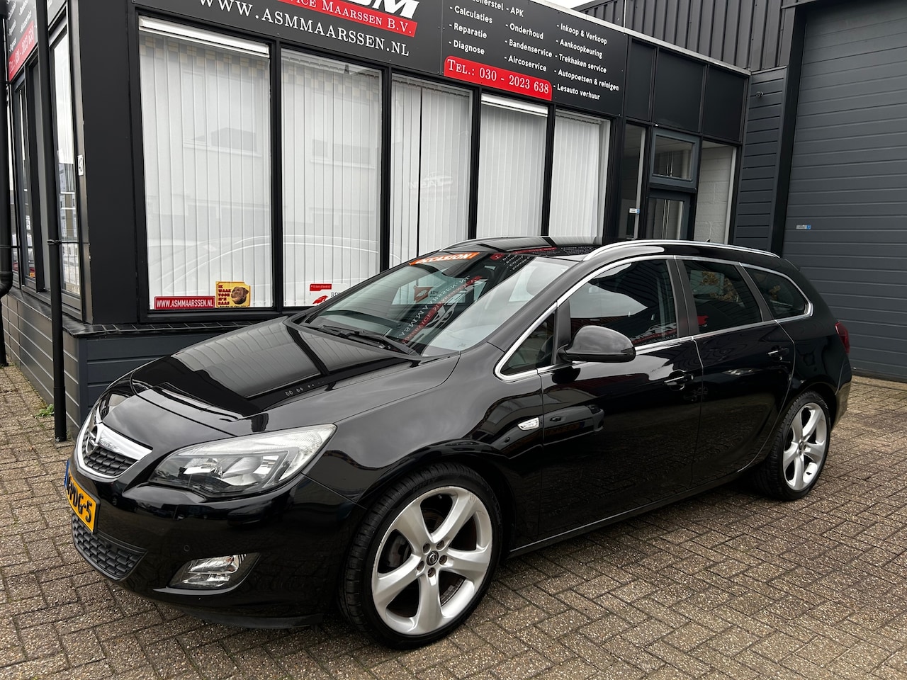 Opel Astra Sports Tourer - 1.4 Turbo Sport 1.4 Turbo Sport - AutoWereld.nl