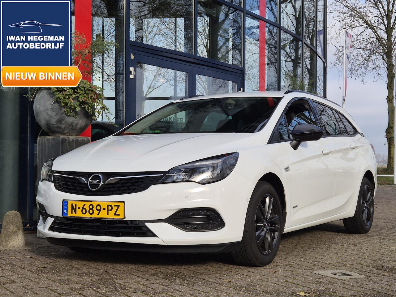 Opel Astra Sports Tourer - 1.2 Design & Tech | Navigatie | Trekhaak | Climate Control | Cruise Control | Licht metale - AutoWereld.nl