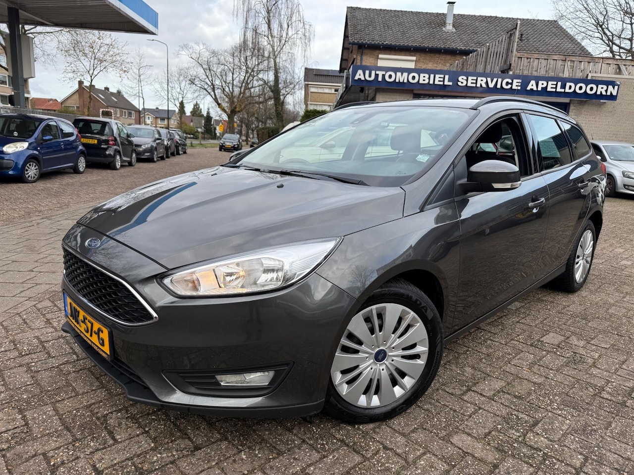 Ford Focus Wagon - 1.0 Titanium *NAVI*STOELVERW.*CRUISE*PDC*AIRCO*OND. BOEKJES* - AutoWereld.nl