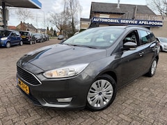 Ford Focus Wagon - 1.0 Titanium *NAVI*STOELVERW.*CRUISE*PDC*AIRCO*OND. BOEKJES