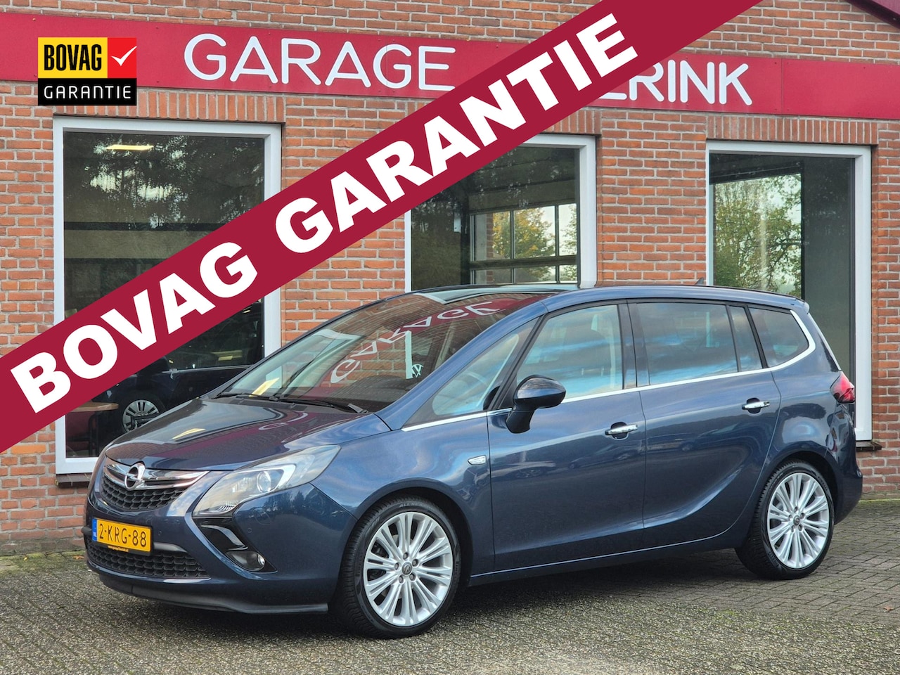 Opel Zafira Tourer - 1.4 Cosmo 7p 140PK 5drs airco, cruise, navi, pdc, lmv, trekhaak, panorama - AutoWereld.nl