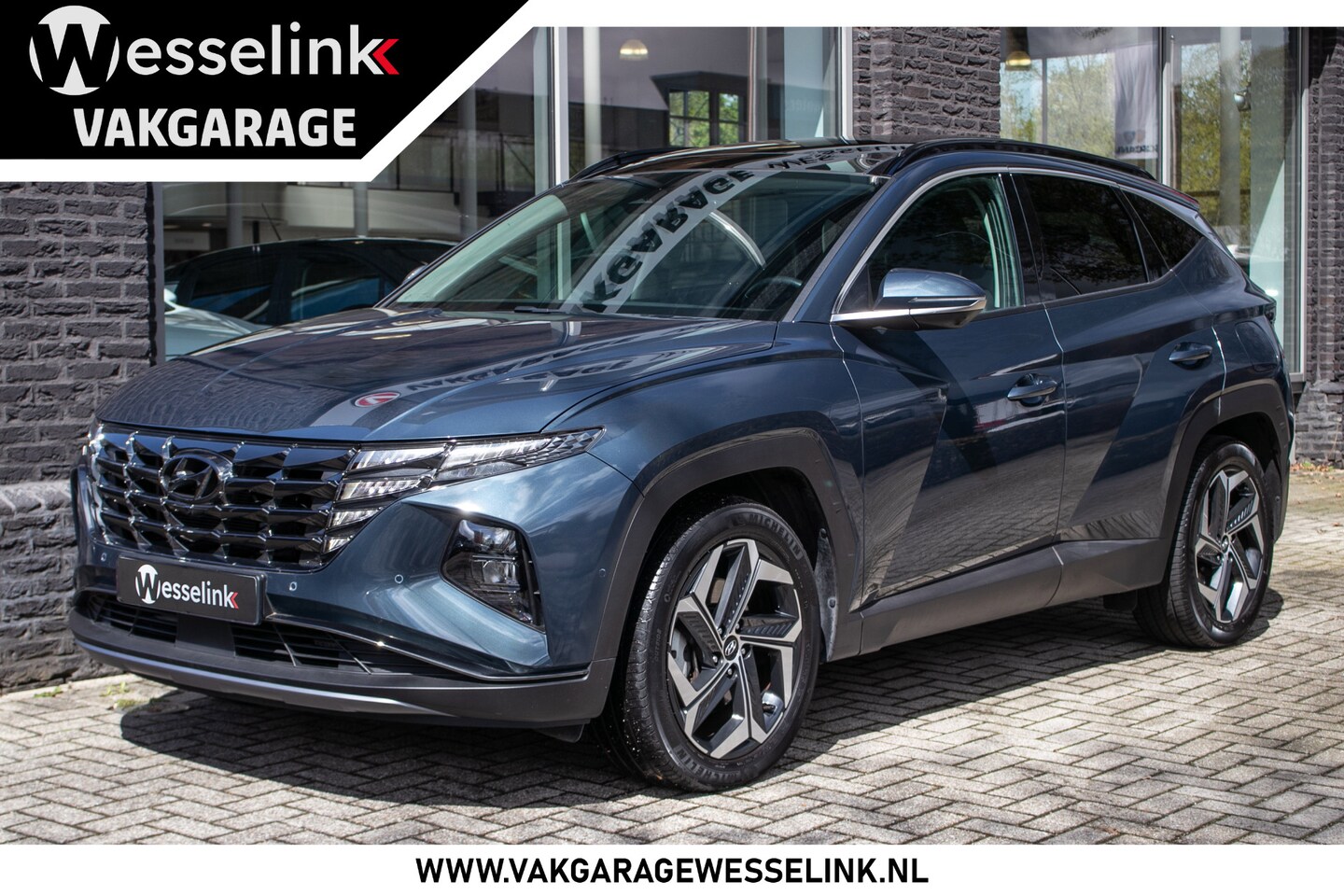 Hyundai Tucson - 1.6 T-GDI PHEV Premium Sky 4WD - Schuif-kanteldak | Apple cp/Android a. - AutoWereld.nl