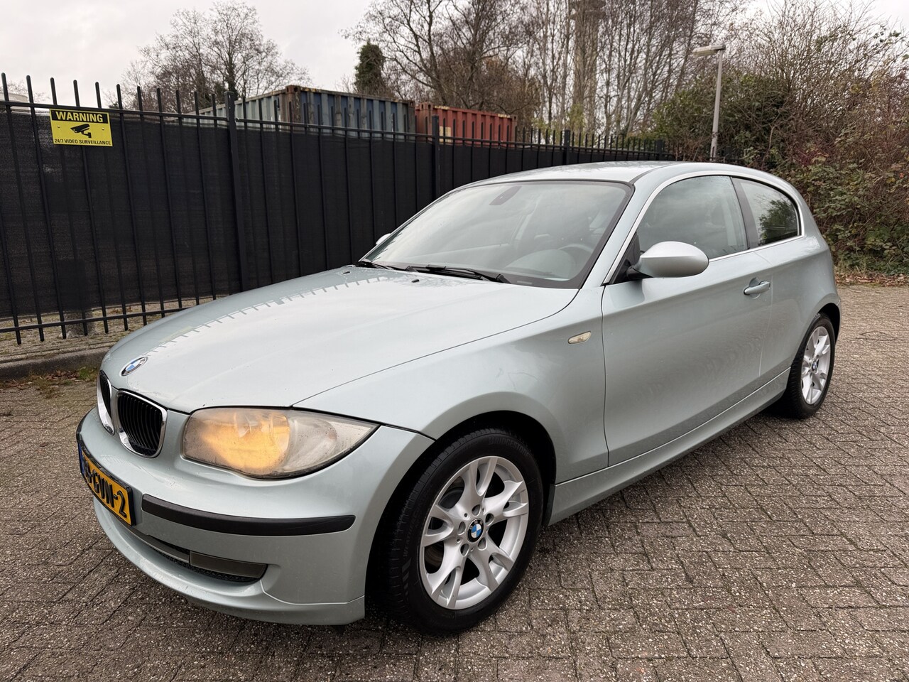 BMW 1-serie - 118i Business Line Sport Int./Airco/Cruise/LMV - AutoWereld.nl