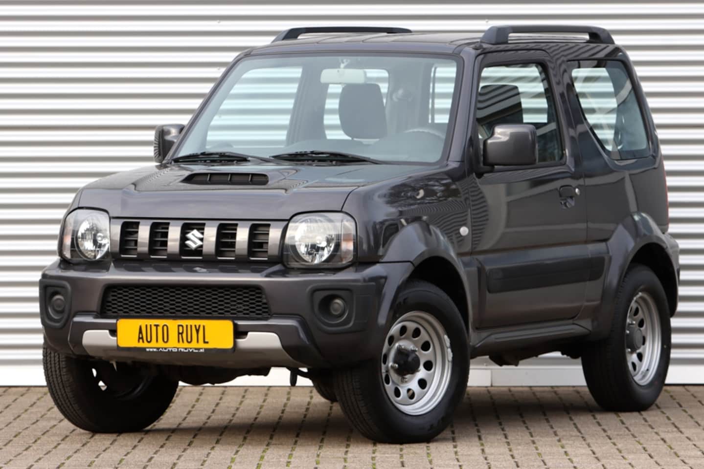 Suzuki Jimny - 1.3 Exclusive Automaat Navi - AutoWereld.nl