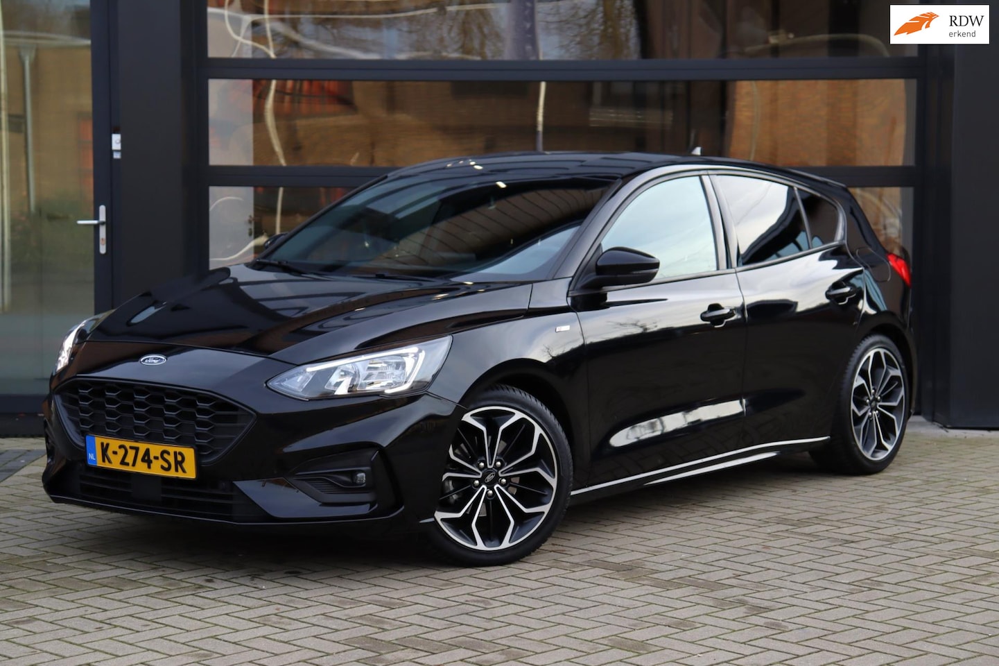 Ford Focus - 1.5 EcoBoost Titanium Business | ST Line | Airco | Cruise | Lane Assist | Navi | Apple Car - AutoWereld.nl