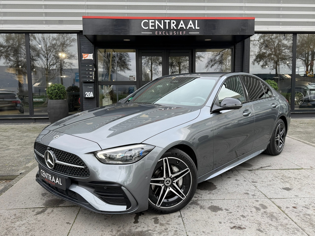 Mercedes-Benz C-klasse - 300 e 4MATIC AMG|Massage|Head-Up|Memory|360Camera|Leder|Ambient Light|Carplay|313PK - AutoWereld.nl