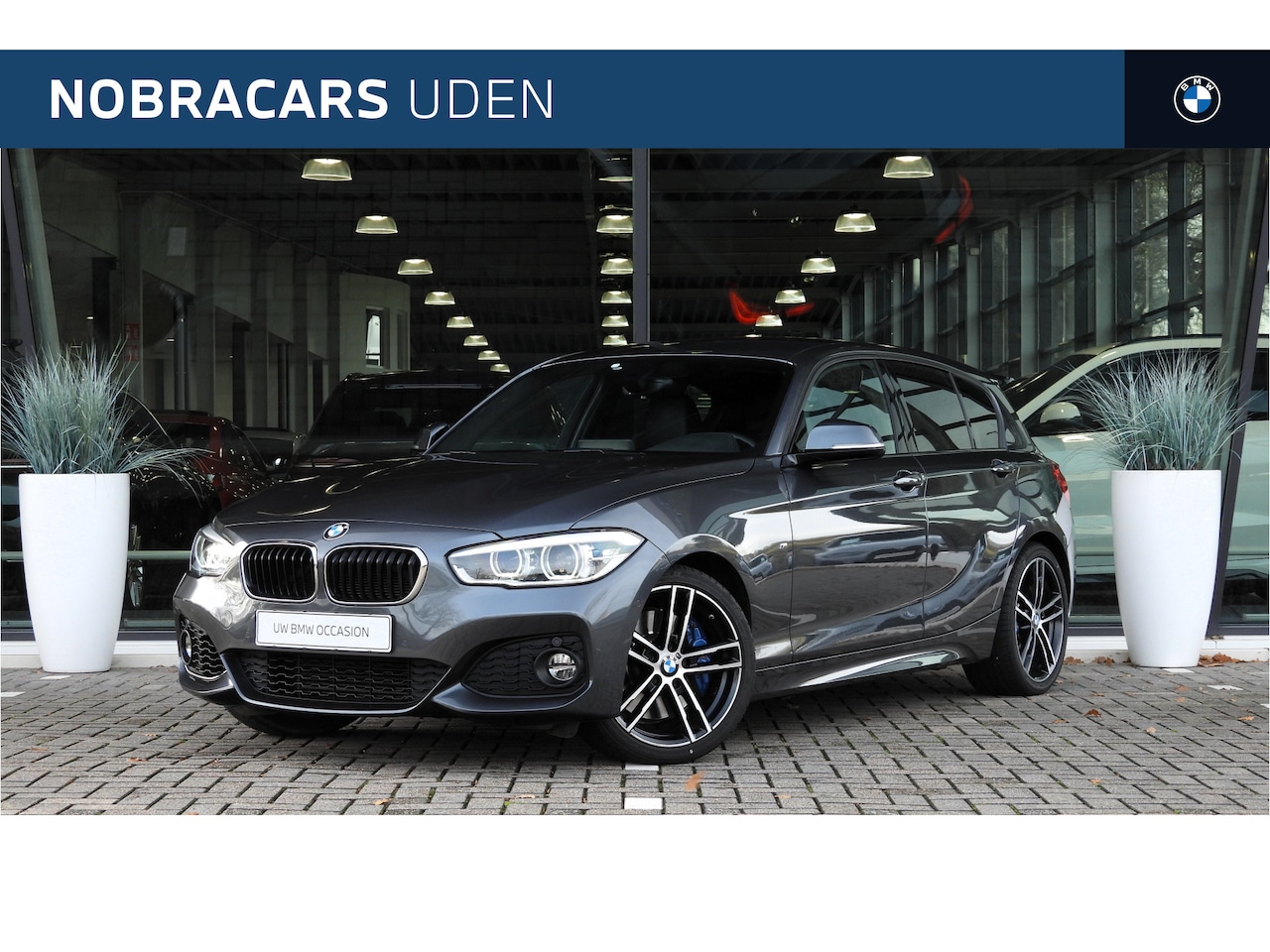 BMW 1-serie - 118i High Executive M Sport Automaat / Sportstoelen / Achteruitrijcamera / Comfort Access - AutoWereld.nl
