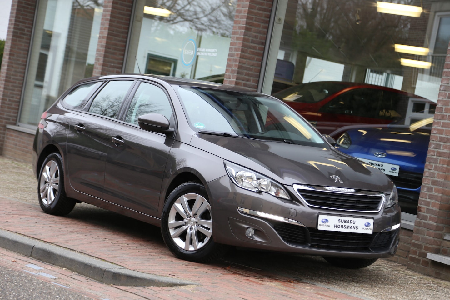 Peugeot 308 SW - 1.2 PureTech Style Navi - AutoWereld.nl