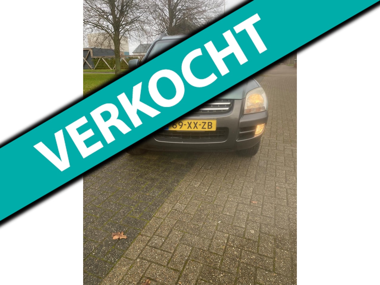 Kia Sportage - 2.0 CVVT Executive 2.0 CVVT Executive - AutoWereld.nl