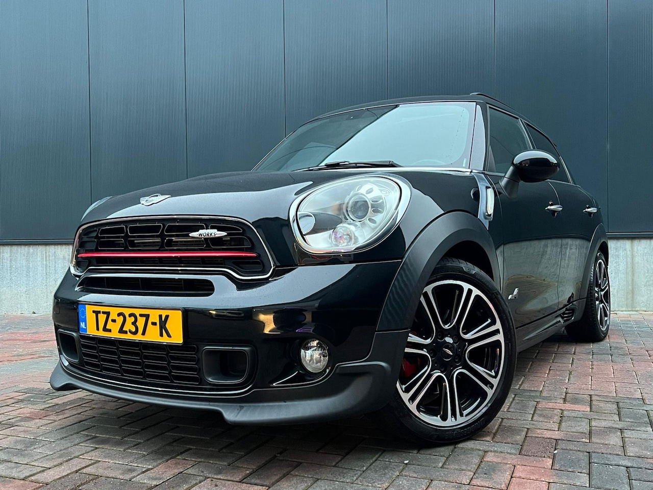 MINI Countryman - Mini 1.6 John Cooper Works ALL4 Chili * Pano * Cruise * Climate * PDC * - AutoWereld.nl