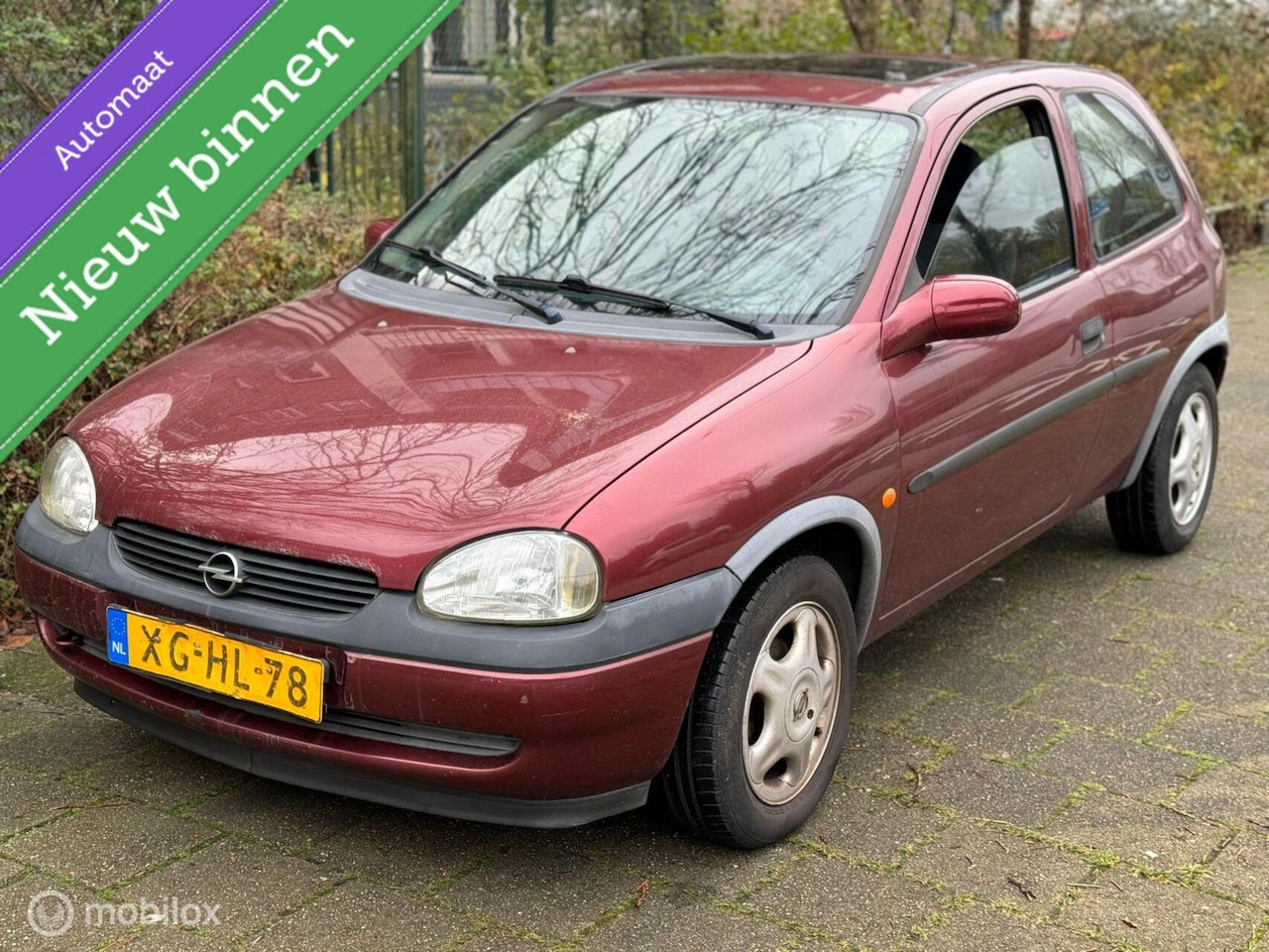 Opel Corsa - 1.2i-16V | NAP | APK | AUTOMAAT | OPEN DAK | - AutoWereld.nl