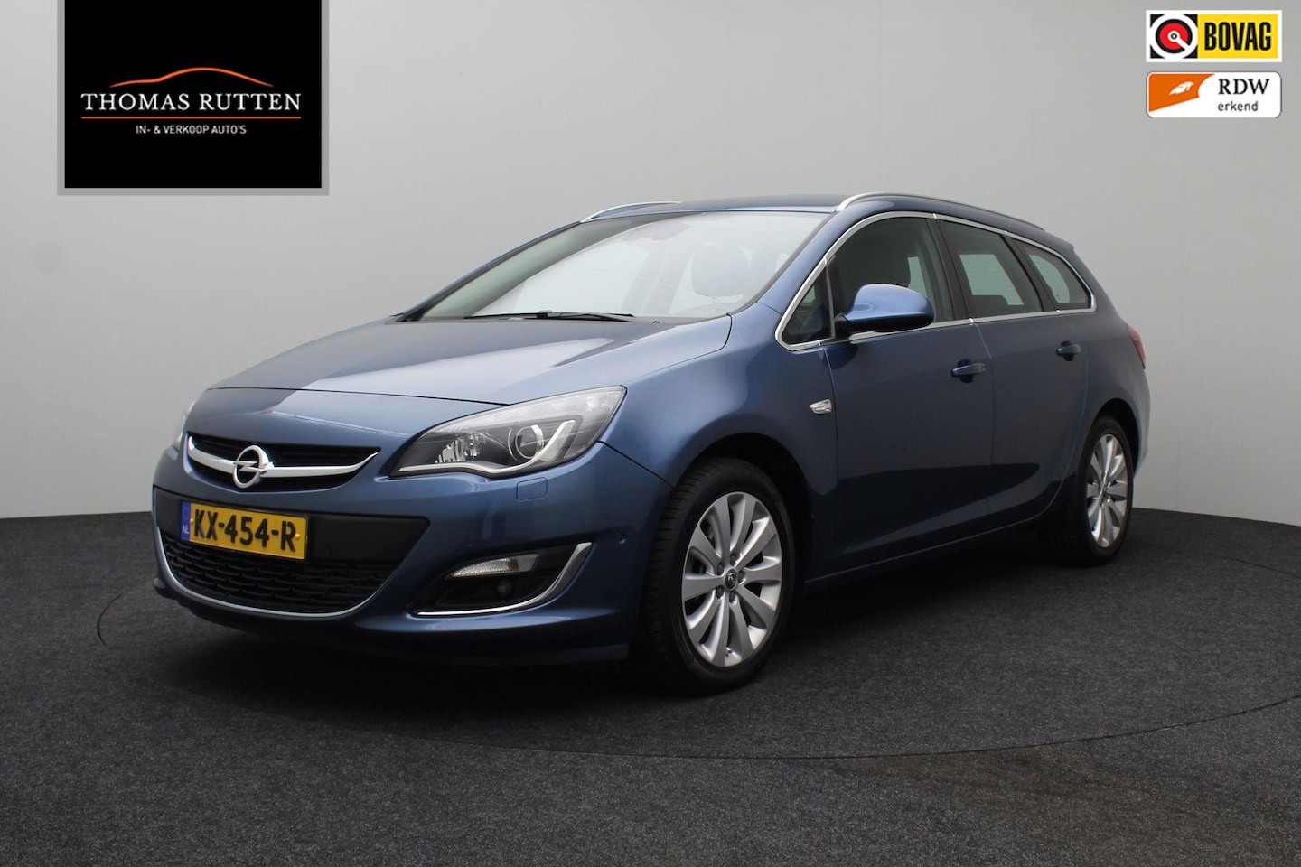 Opel Astra Sports Tourer - 1.4 Turbo Blitz 2016 Airco | Navigatie | Cruise control | Bluetooth USB | Trekhaak | Licht - AutoWereld.nl