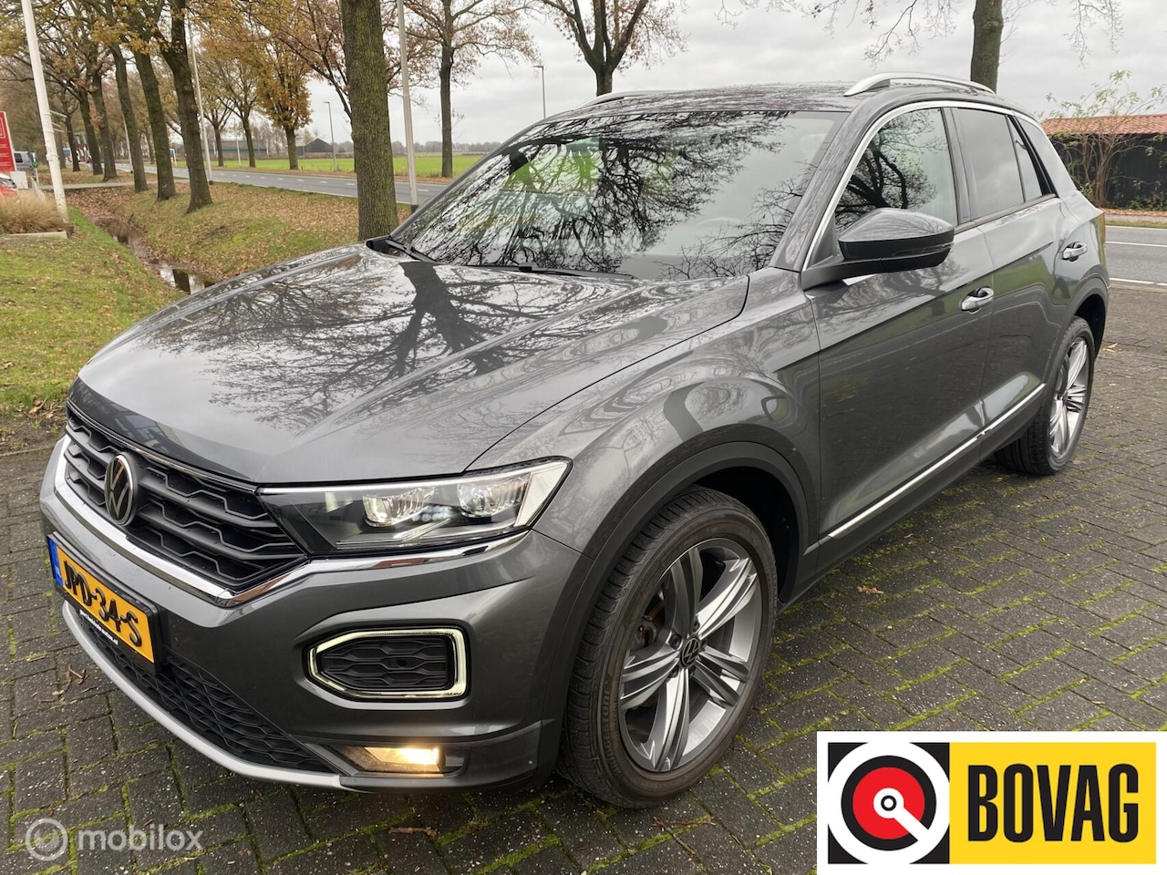 Volkswagen T-Roc - 1.5 TSI I R Line velgen I Sport I LED INavigarie I - AutoWereld.nl