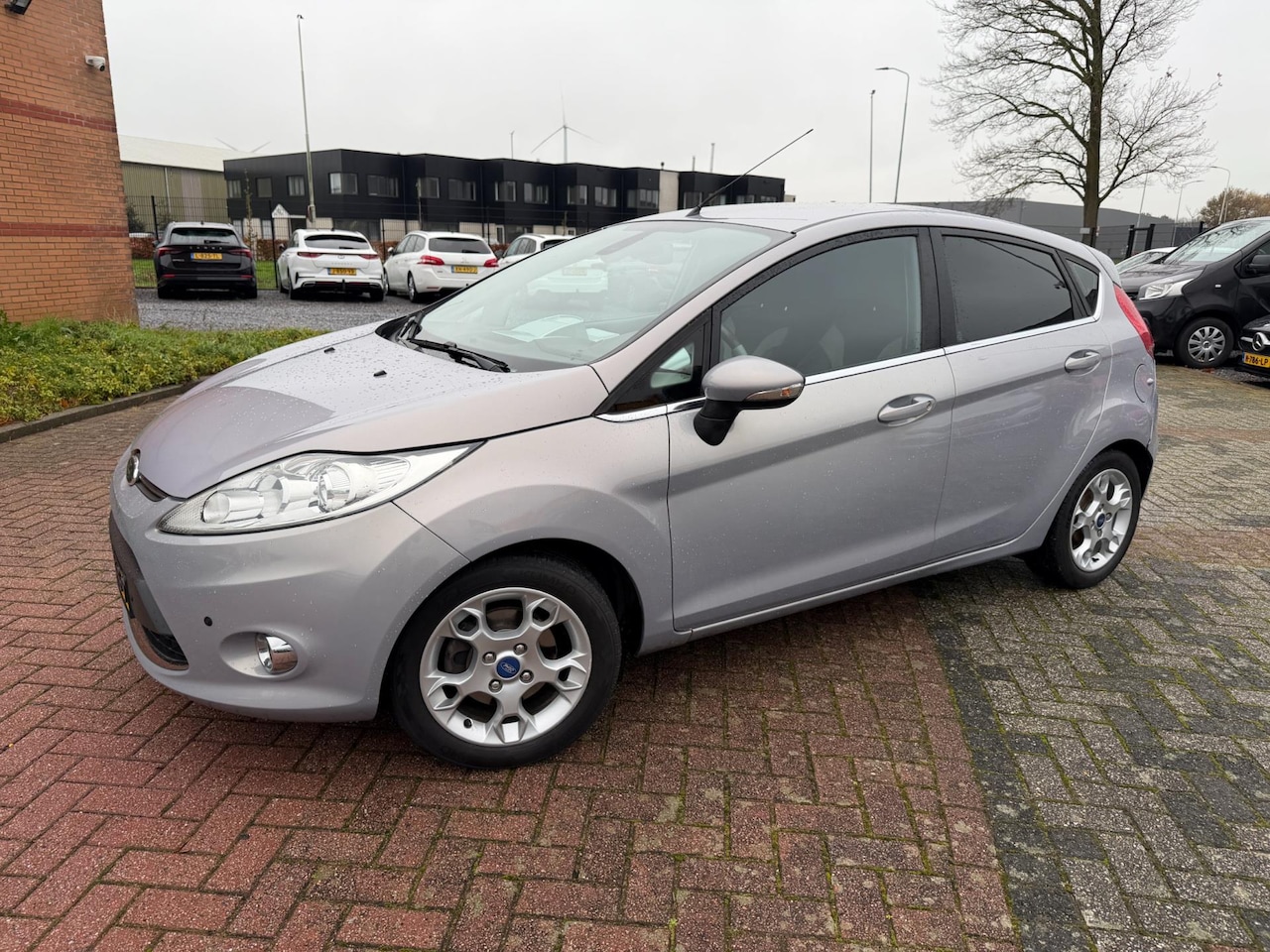 Ford Fiesta - 1.6 TDCi ECOnetic Titanium 1.6 TDCi ECOnetic Titanium, Leder, Navi, Trekhaak, PDC V+A - AutoWereld.nl