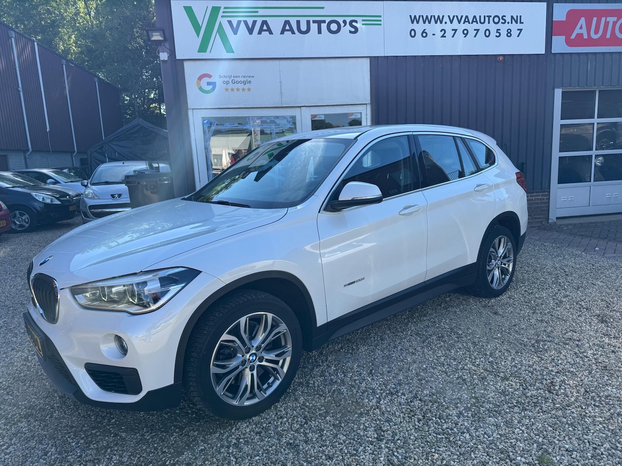 BMW X1 - SDrive20i AUTOMAAT cruise,clima,headup, schuifdak! - AutoWereld.nl